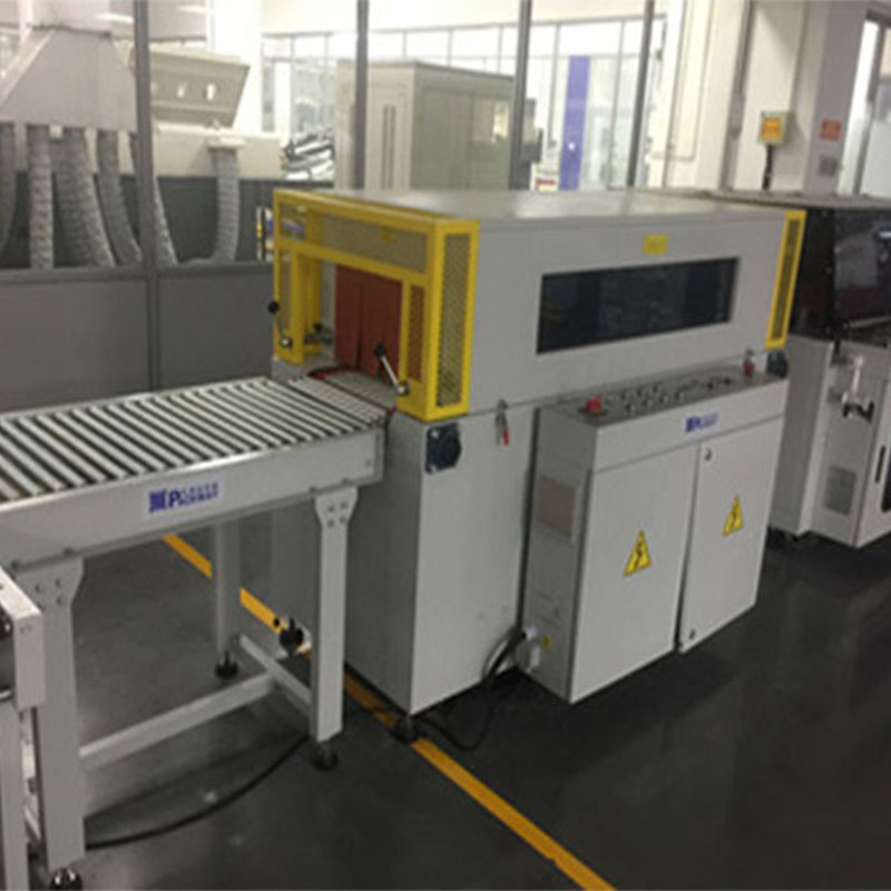 High speed automatic heat shrink packaging machine